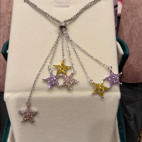 Elegant Silver and Gold Star Necklace - Picture 7 of 11